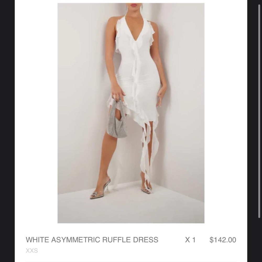 White asymmetrical ruffle dress
Brand new with tags
